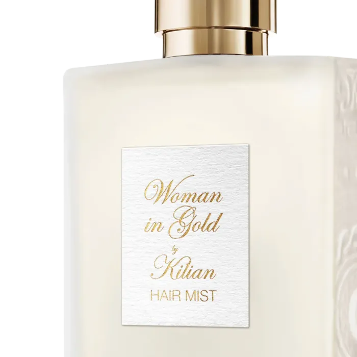 Woman in Gold Hair Mist